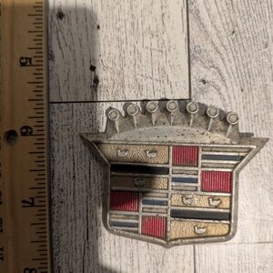 Cadillac Silver and Red Car Emblem